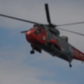 Naval search and rescue helicopter over the garden at seasidecottagescornwall.co.uk Poldhu Cove - added 30/04/2012 by Mark and Doreen